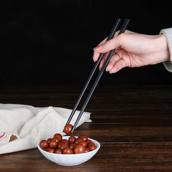 1Pair Jaapani söögipulgad Must Sushi kiirtoit Nuudlid haki pulgad korea Lauanõud Köök, Baari Tarvikud Hiina Söögiriistad